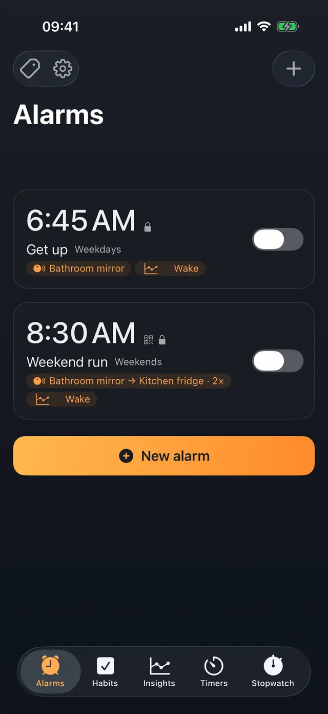 Tagdawn Alarms screen with a 6:45 AM weekday alarm, an 8:30 AM weekend alarm, NFC ritual and Wake insight badges, and a New alarm button.